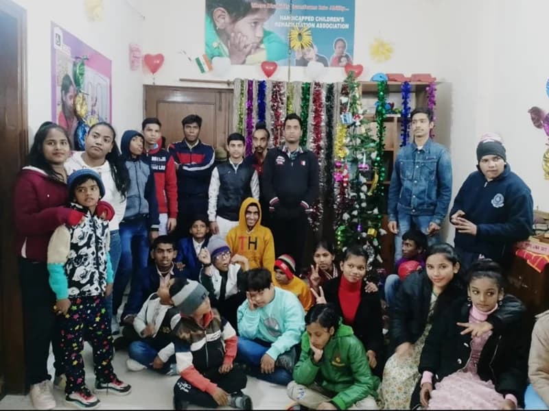 HCRA staff and children together at the centre